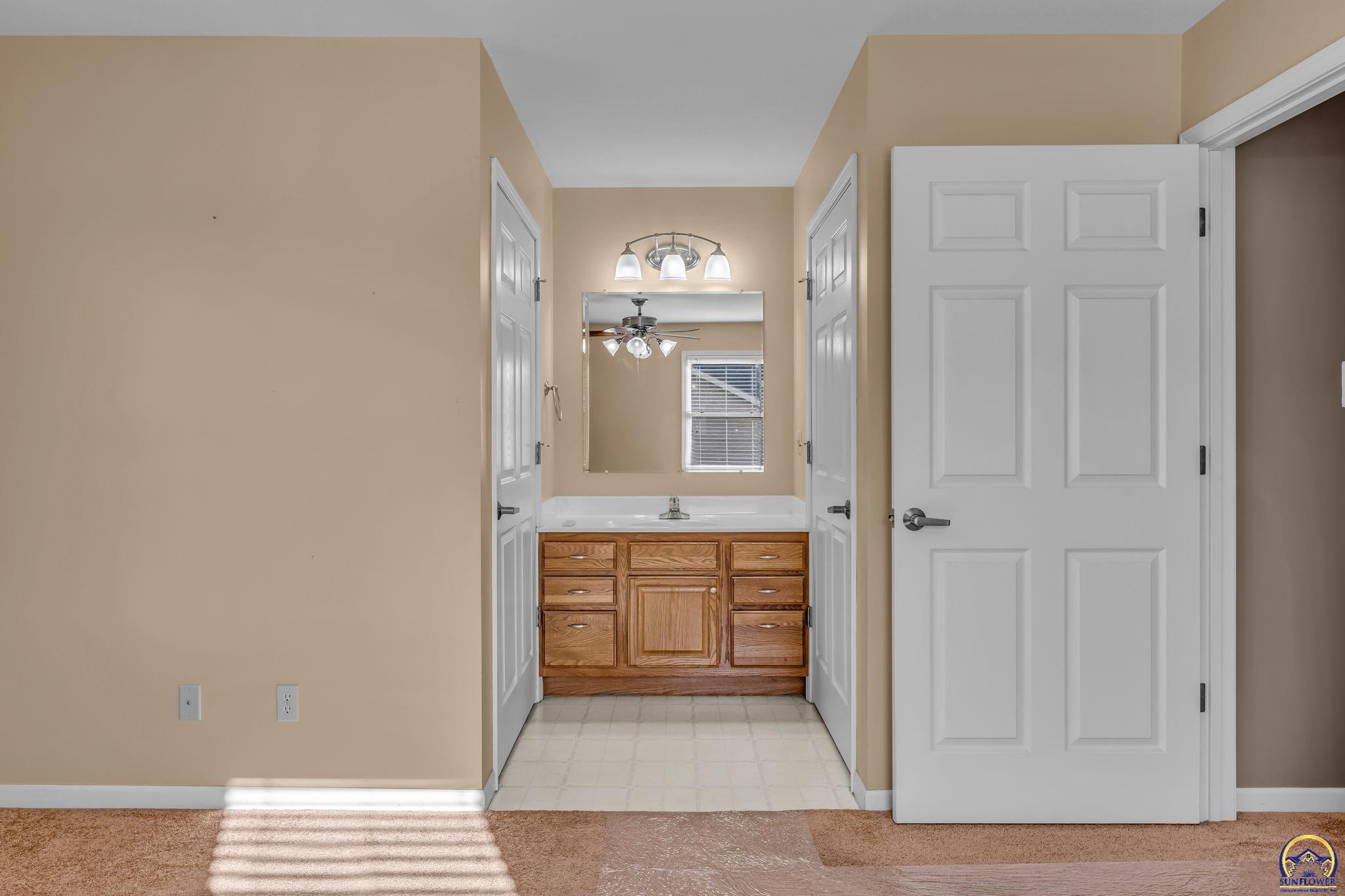 2393 Southwest Honeysuckle Lane Topeka, KS 66614 - Photo 21 of 40 Primary Bathroom