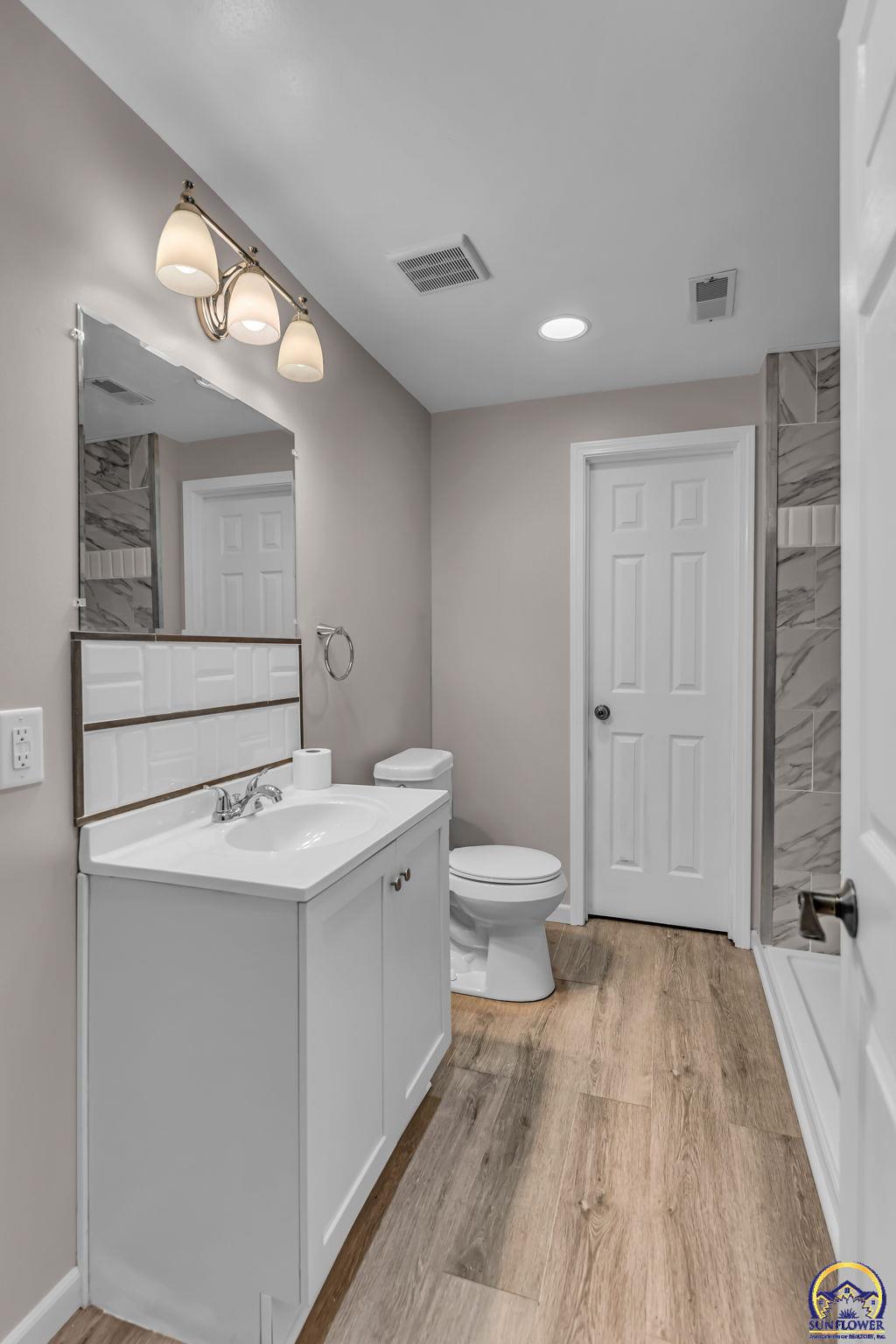 2393 Southwest Honeysuckle Lane Topeka, KS 66614 - Photo 32 of 40 Basement Full Bathroom