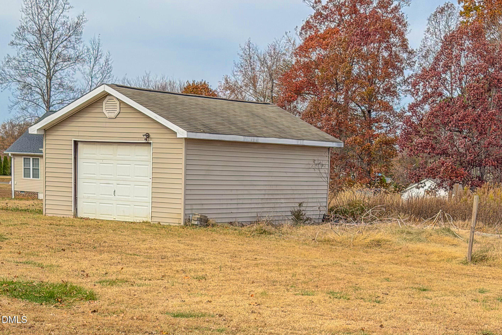 111 Fox Crossing Drive Roxboro, NC 27574 - Photo 22 of 25 a house with trees in the background