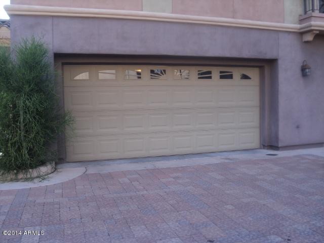 3935 East Rough Rider Road, Unit 1201 Phoenix, AZ 85050 - Photo 16 of 26 Two Car Garage