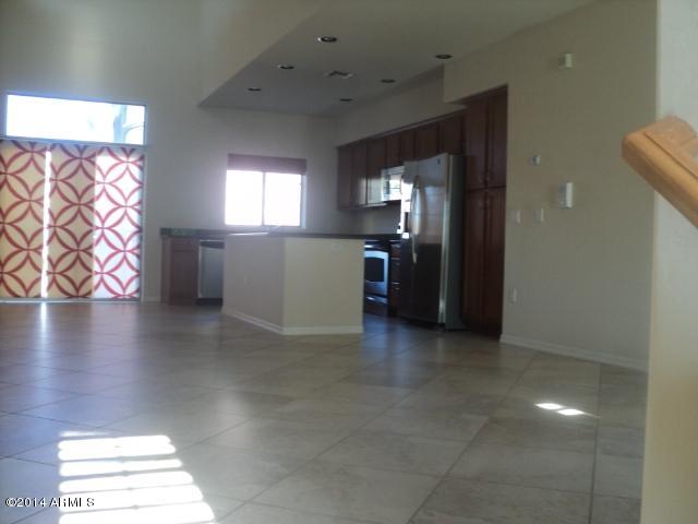 3935 East Rough Rider Road, Unit 1201 Phoenix, AZ 85050 - Photo 6 of 26 Great Room, Kitchen & Dining