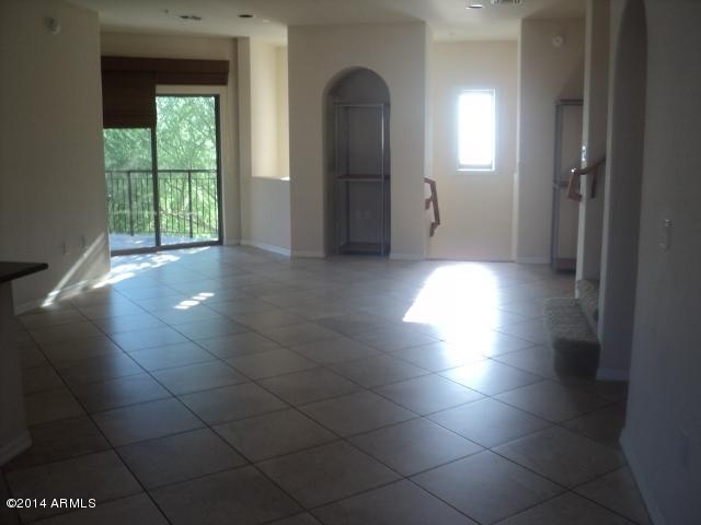 3935 East Rough Rider Road, Unit 1201 Phoenix, AZ 85050 - Photo 7 of 26 Greatroom & Balcony