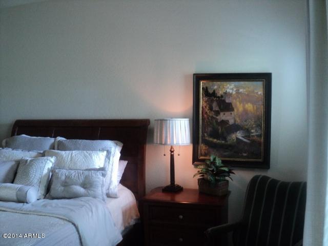 3935 East Rough Rider Road, Unit 1201 Phoenix, AZ 85050 - Photo 9 of 26 Master Bed Opens to Balcony