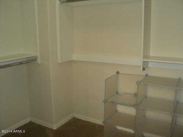 3935 East Rough Rider Road, Unit 1201 Phoenix, AZ 85050 - Photo 10 of 26 Master Spacious Walk-in Closet