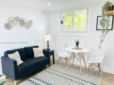2612 Southwest 12th Street Miami, FL 33135 - Photo 3 of 3 a living room with furniture and a table