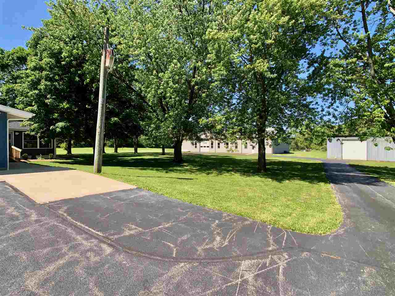 747 Searls Road Amboy, IL 61310 - Photo 11 of 40 a view of a park with tree s