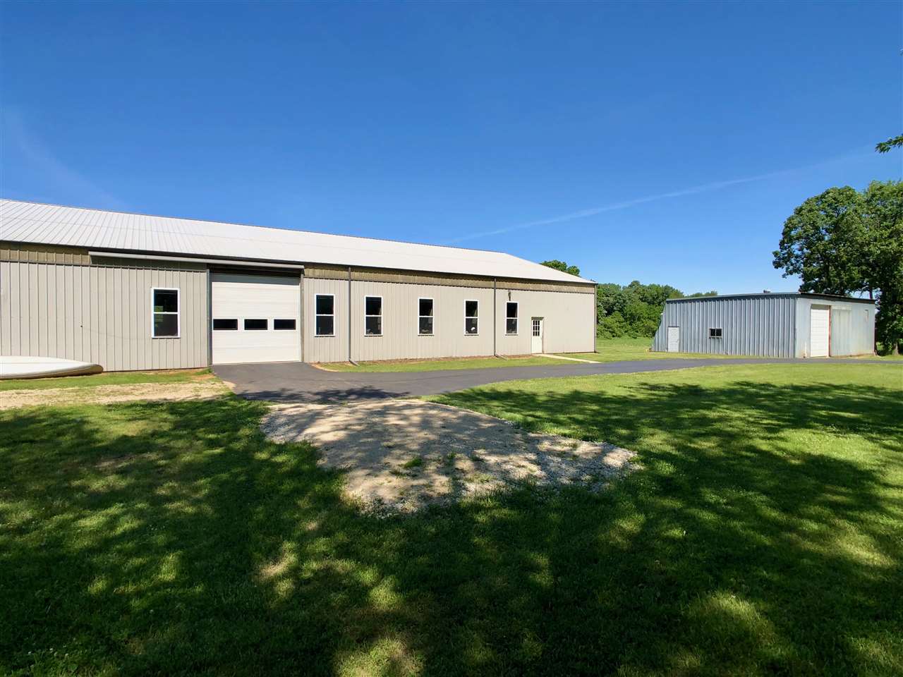 747 Searls Road Amboy, IL 61310 - Photo 12 of 40 a view of a house with a backyard space