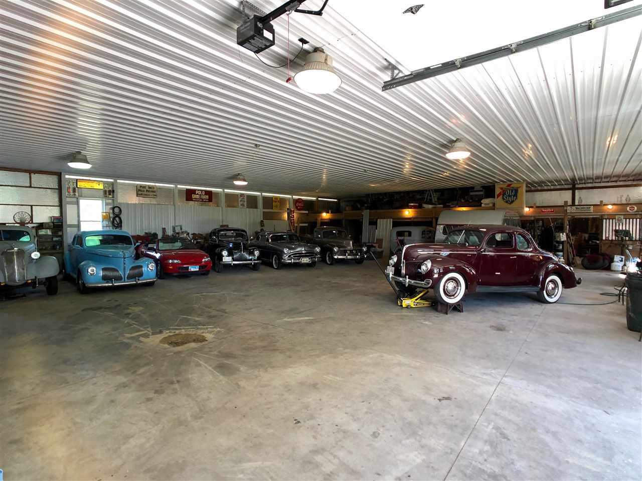 747 Searls Road Amboy, IL 61310 - Photo 16 of 40 a car parked in parking