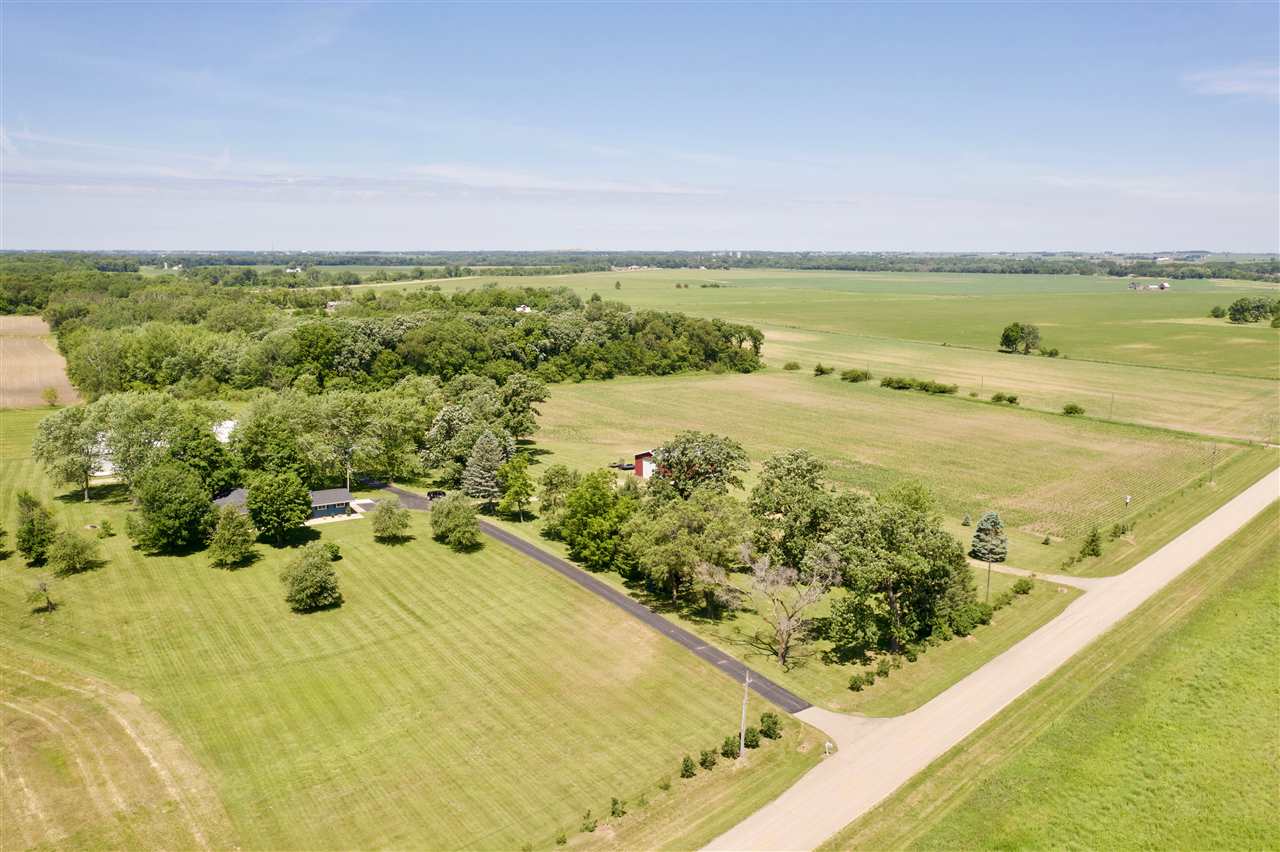 747 Searls Road Amboy, IL 61310 - Photo 2 of 40 a view of a swimming pool and an ocean