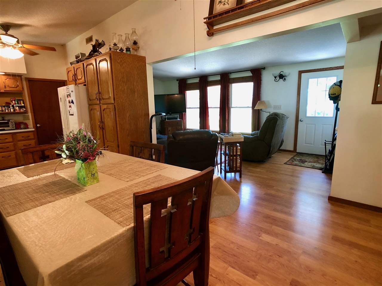 747 Searls Road Amboy, IL 61310 - Photo 30 of 40 a view of a dining room with furniture and wooden floor