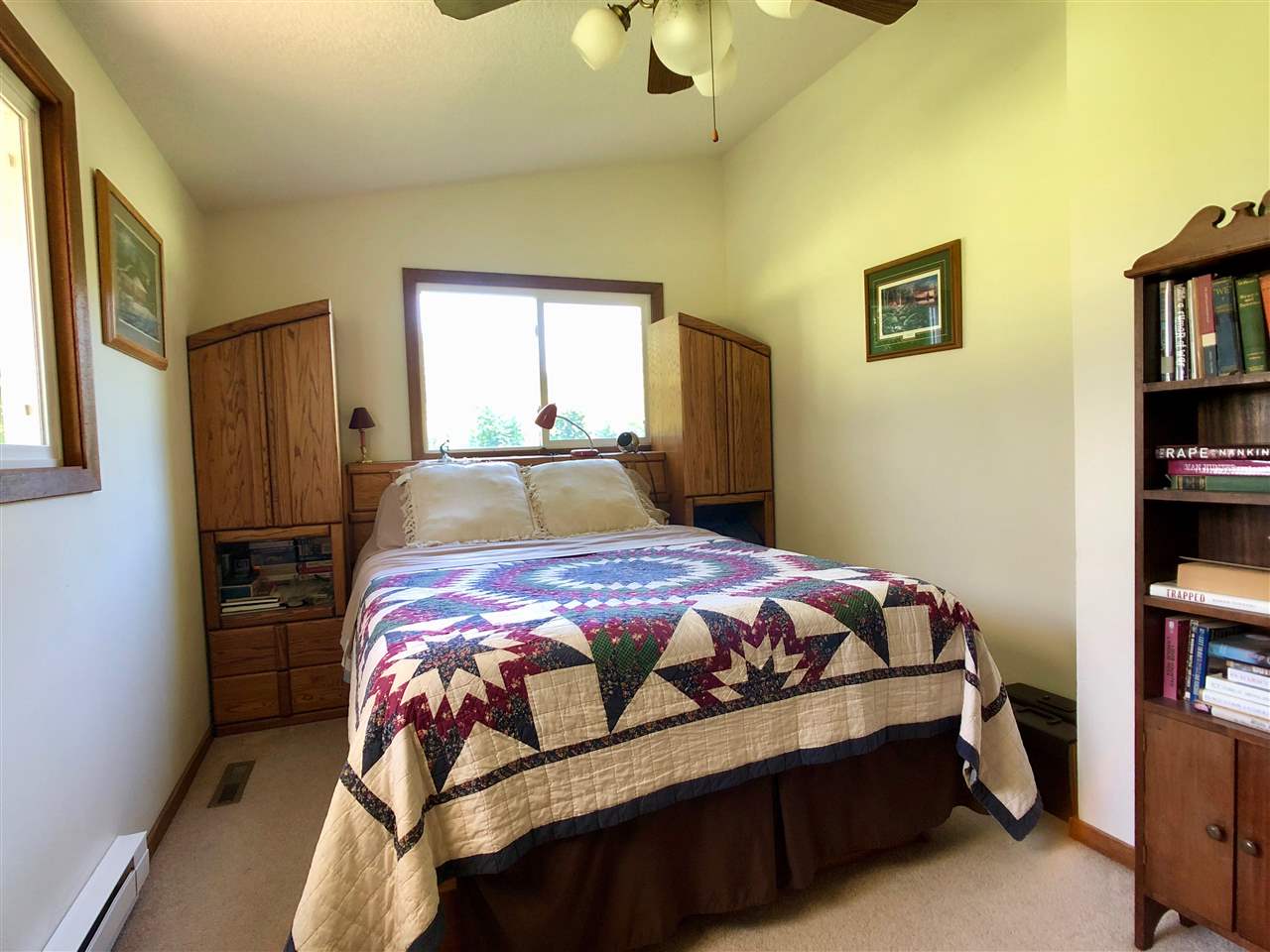 747 Searls Road Amboy, IL 61310 - Photo 32 of 40 a bedroom with a bed furniture and a window