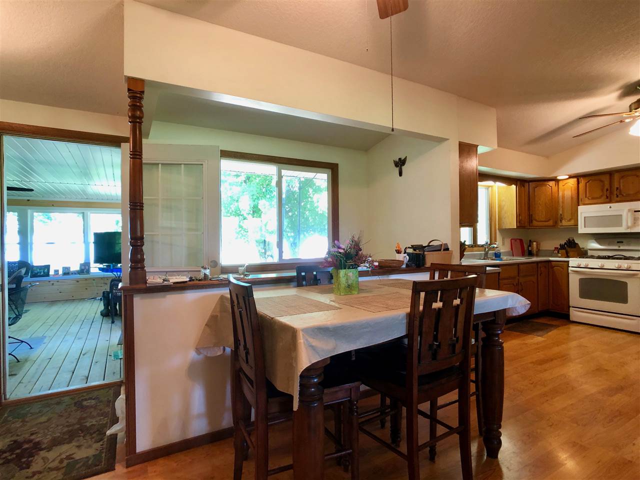 747 Searls Road Amboy, IL 61310 - Photo 37 of 40 a view of a dining room with furniture and a livingroom