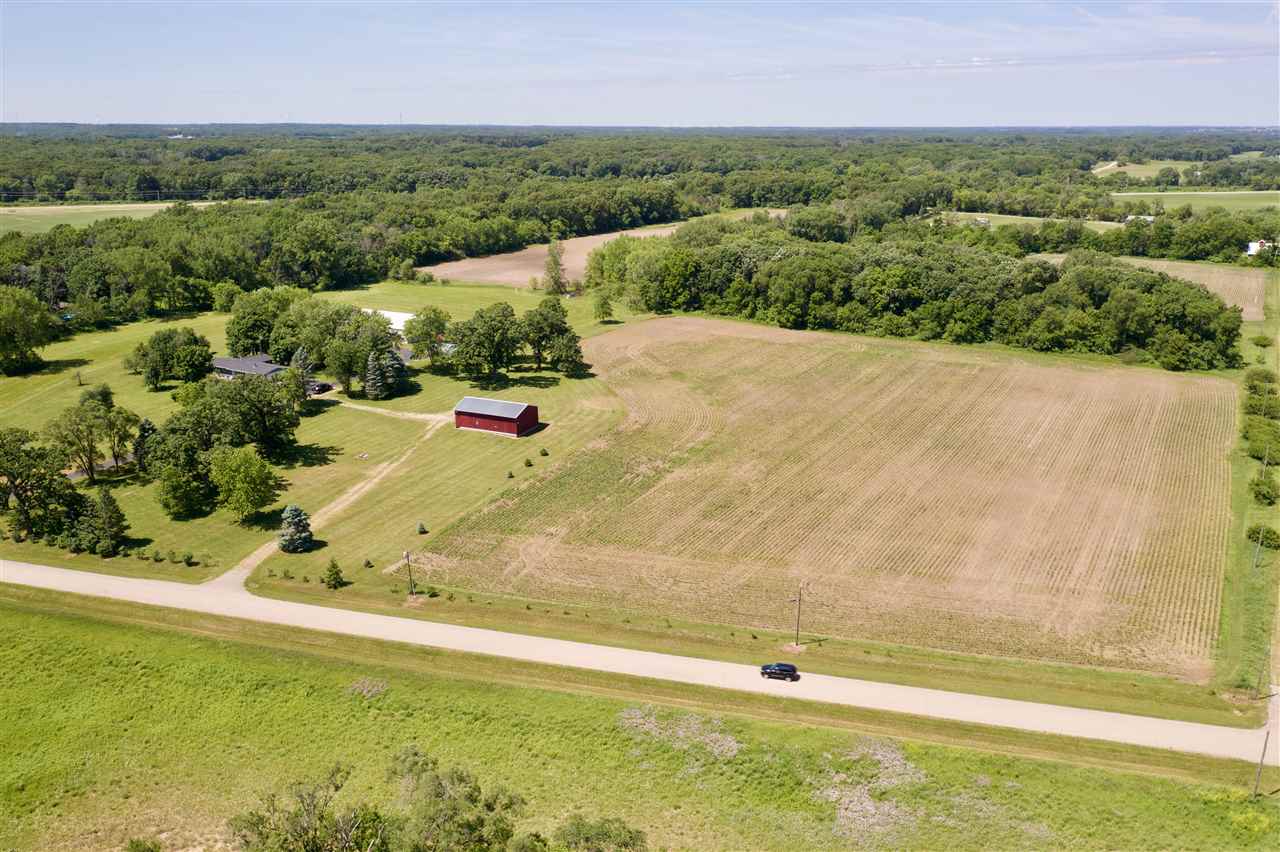 747 Searls Road Amboy, IL 61310 - Photo 40 of 40 an aerial view of a house with a yard