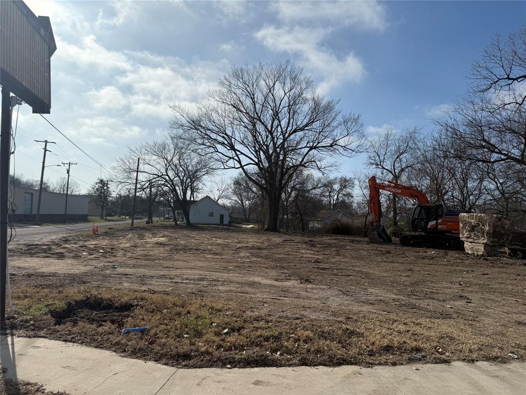 a view of a yard covered with snow in the yard