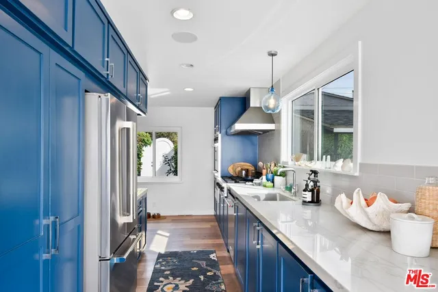 a kitchen with granite countertop lots of counter top space