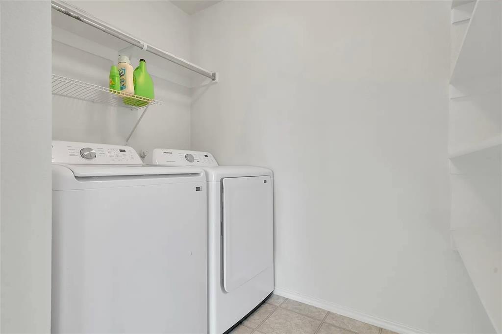 713 Baldwin Road Wylie, TX 75098 - Photo 20 of 29 a utility room with dryer and washer