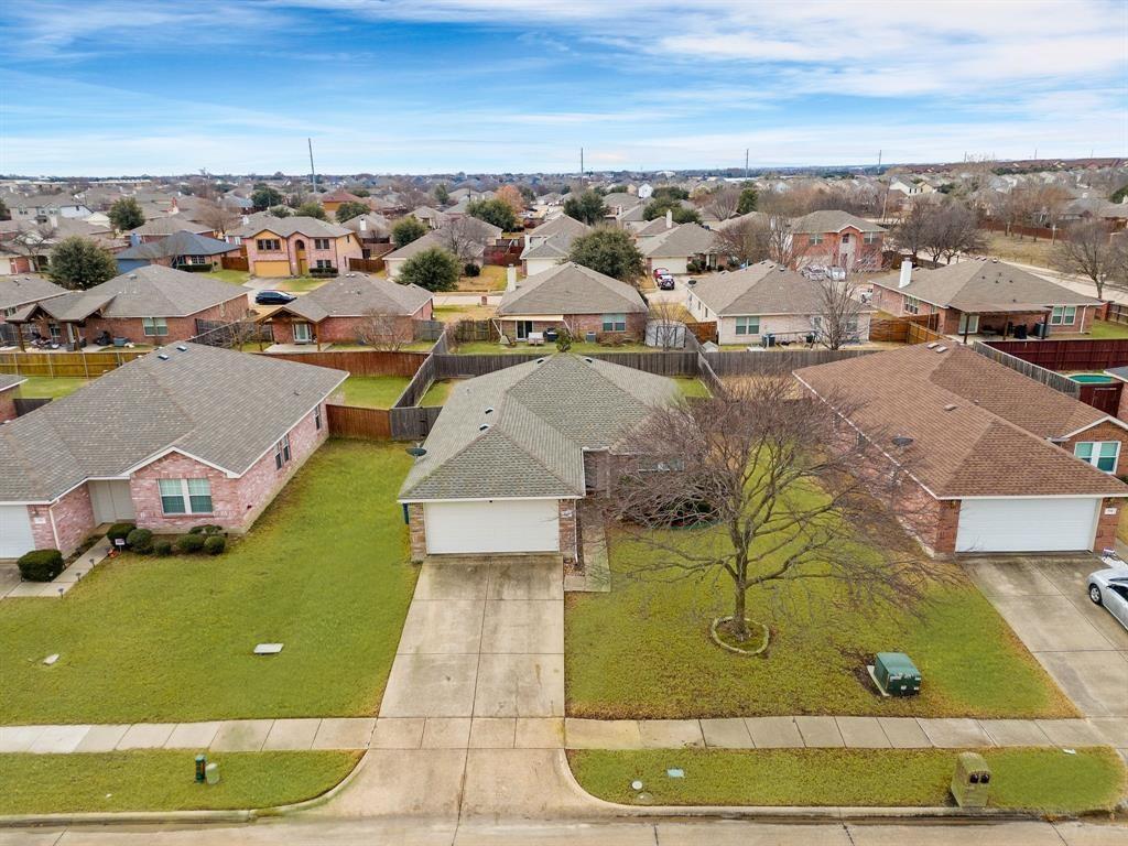 713 Baldwin Road Wylie, TX 75098 - Photo 4 of 29 an aerial view of a house with a swimming pool