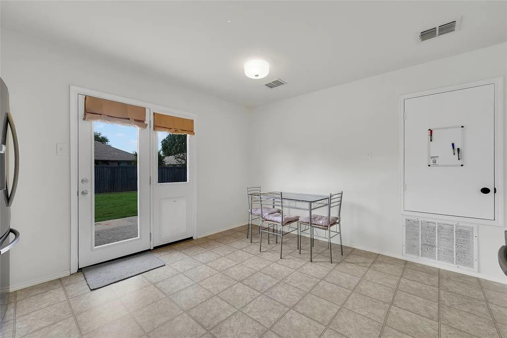713 Baldwin Road Wylie, TX 75098 - Photo 10 of 29 a view of a livingroom with furniture and windows