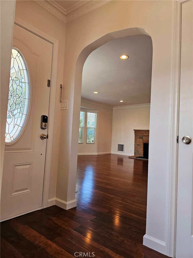 5259 Angeles Vista Boulevard View Park, CA 90043 - Photo 11 of 42 wooden floor in an empty room with a window