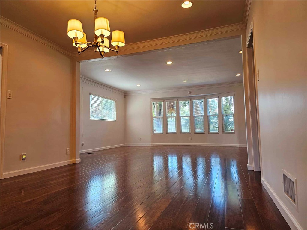 5259 Angeles Vista Boulevard View Park, CA 90043 - Photo 18 of 42 a view of a livingroom with wooden floor