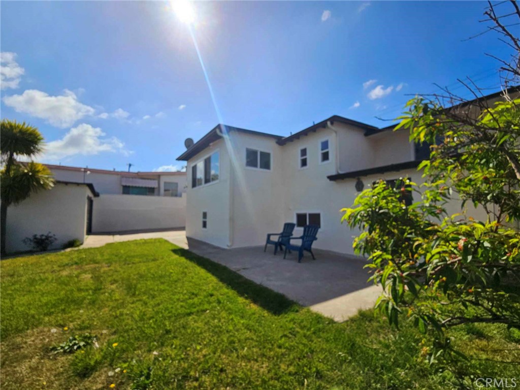 5259 Angeles Vista Boulevard View Park, CA 90043 - Photo 41 of 42 a view of backyard with a patio