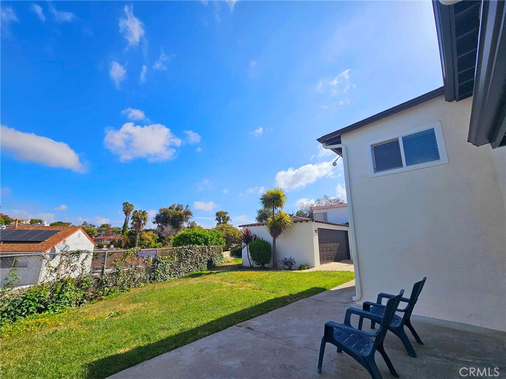 5259 Angeles Vista Boulevard View Park, CA 90043 - Photo 42 of 42 a view of a house with backyard and sitting area