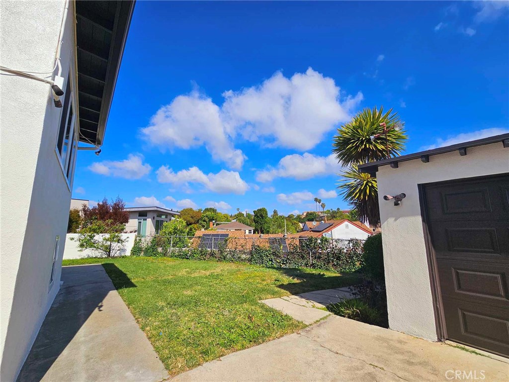5259 Angeles Vista Boulevard View Park, CA 90043 - Photo 10 of 42 a view of a porch with a yard