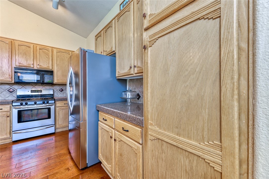 2001 Appaloosa Road Henderson, NV 89002 - Photo 22 of 44 This spacious kitchen offers ample cabinet storage and stainless steel appliances.