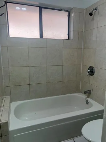 an empty room with a wooden floor