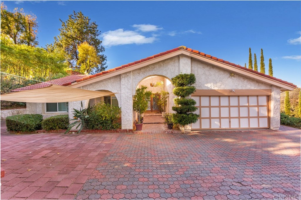 3117 Voltaire Drive Topanga, CA 90290 - Photo 2 of 14 a view of a house with a patio