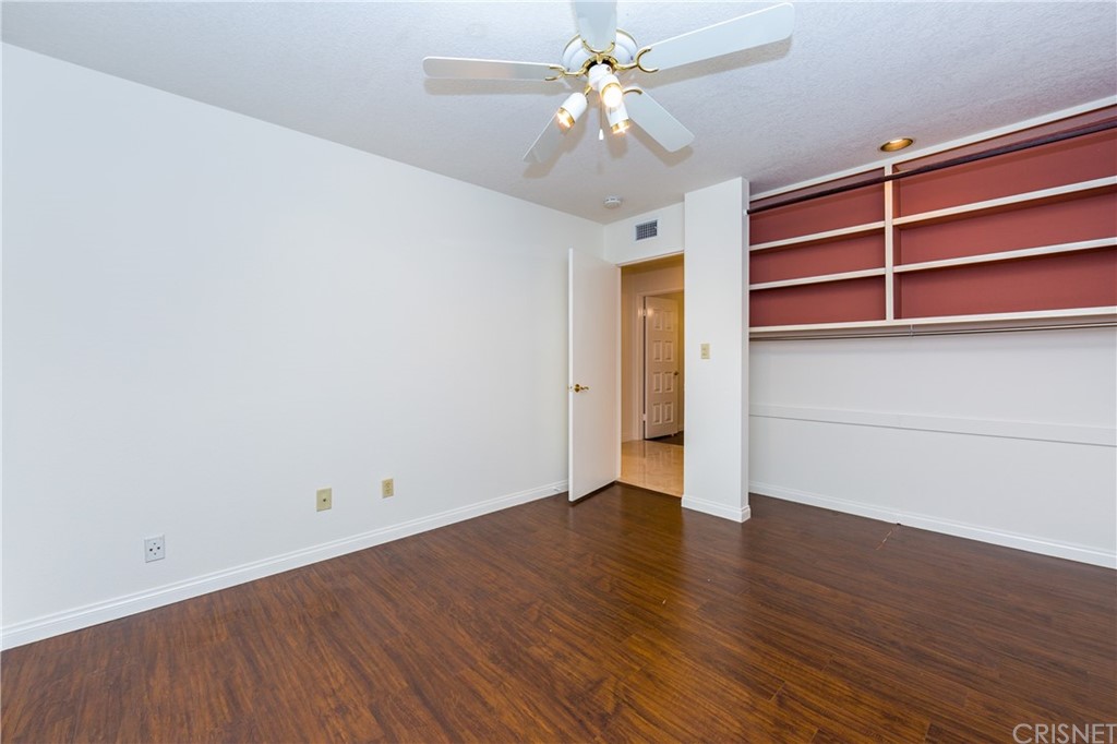 3117 Voltaire Drive Topanga, CA 90290 - Photo 8 of 14 a view of an empty room with a window and wooden floor