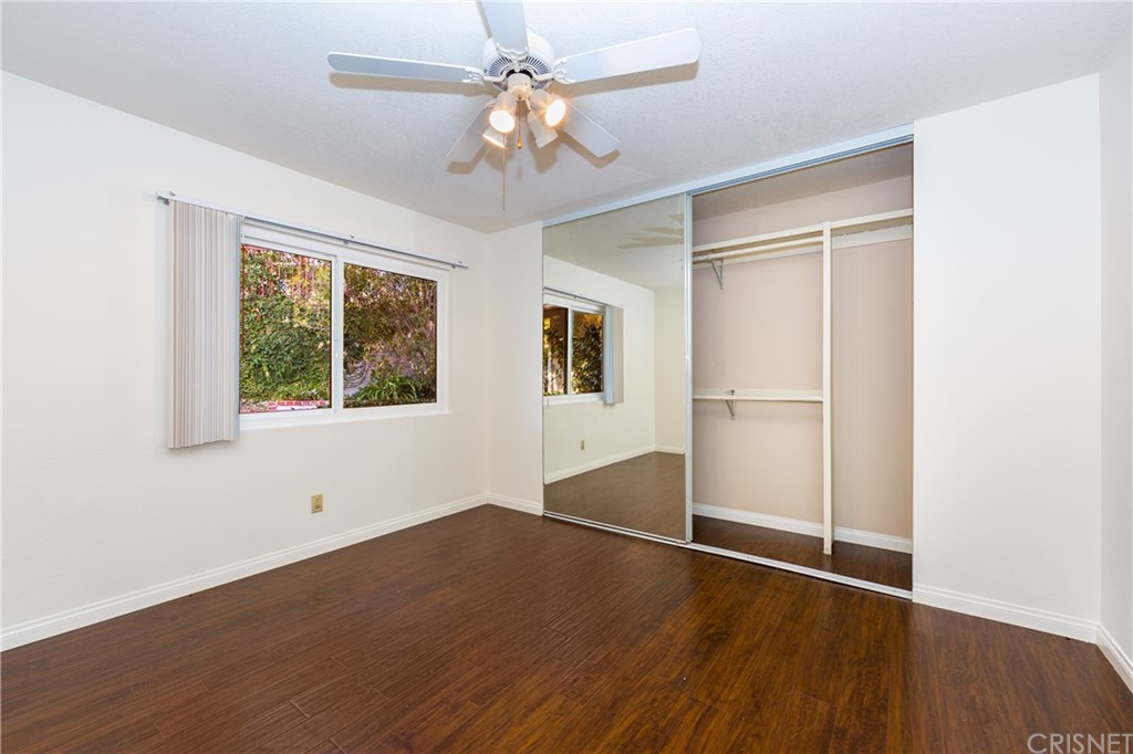 3117 Voltaire Drive Topanga, CA 90290 - Photo 9 of 14 a view of empty room with wooden floor and fan