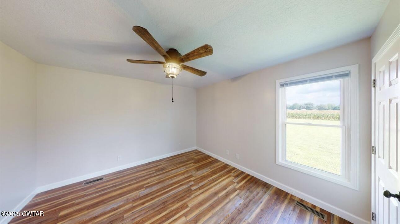 40 J D Barr Road Milan, TN 38358 - Photo 15 of 28 an empty room with a window