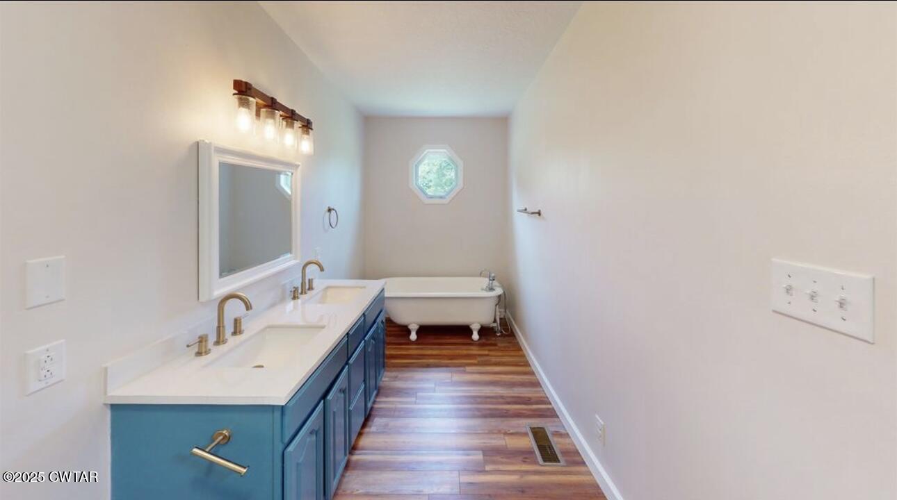 40 J D Barr Road Milan, TN 38358 - Photo 18 of 28 a bathroom with a sink and a mirror