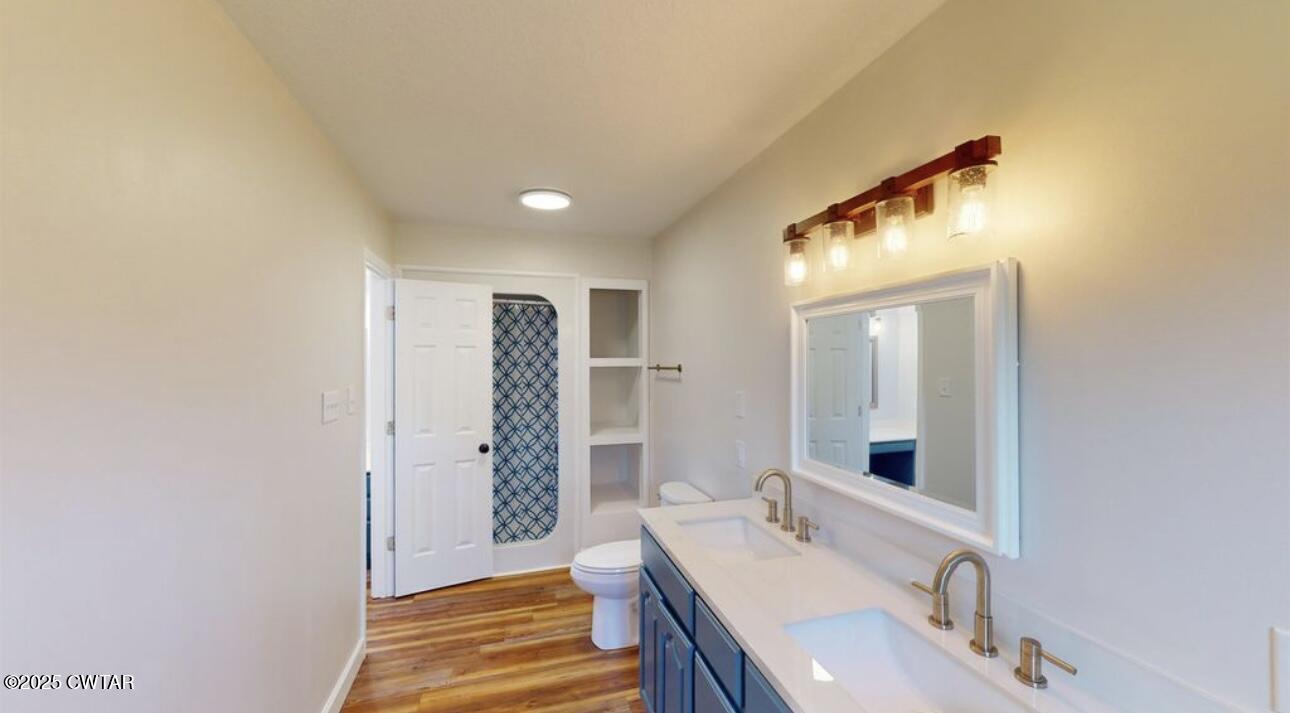 40 J D Barr Road Milan, TN 38358 - Photo 19 of 28 a bathroom with a sink and a mirror
