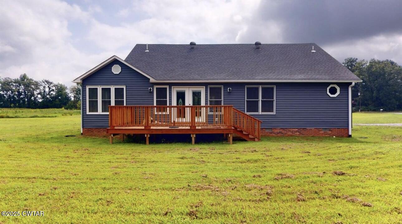 40 J D Barr Road Milan, TN 38358 - Photo 24 of 28 a backyard of a house with yard and balcony