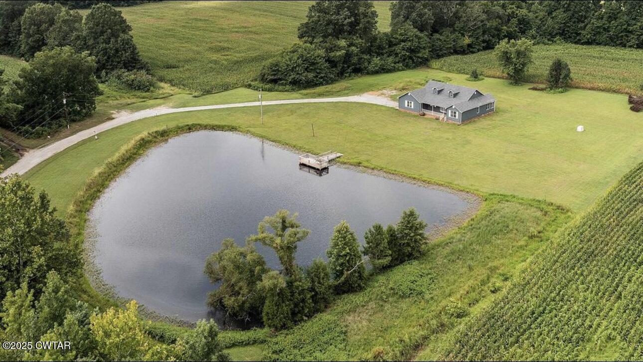 40 J D Barr Road Milan, TN 38358 - Photo 25 of 28 a view of a swimming pool with a yard