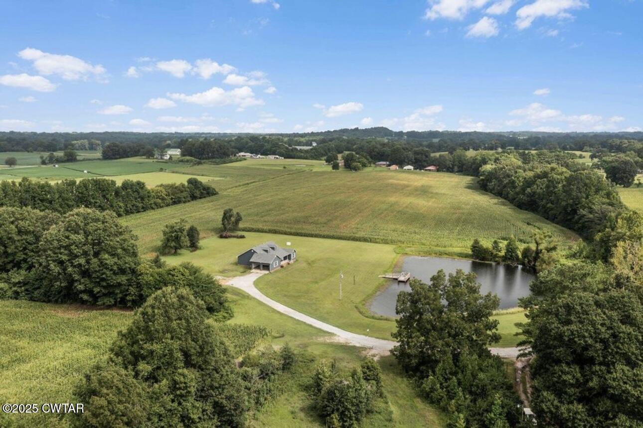 40 J D Barr Road Milan, TN 38358 - Photo 26 of 28 an aerial view of a houses with outdoor space and river