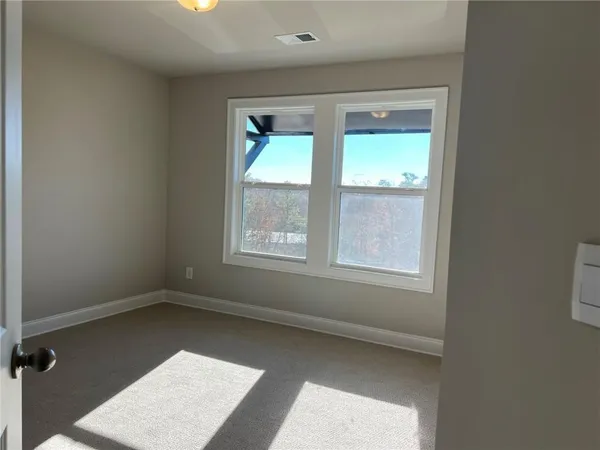 an empty room with a window