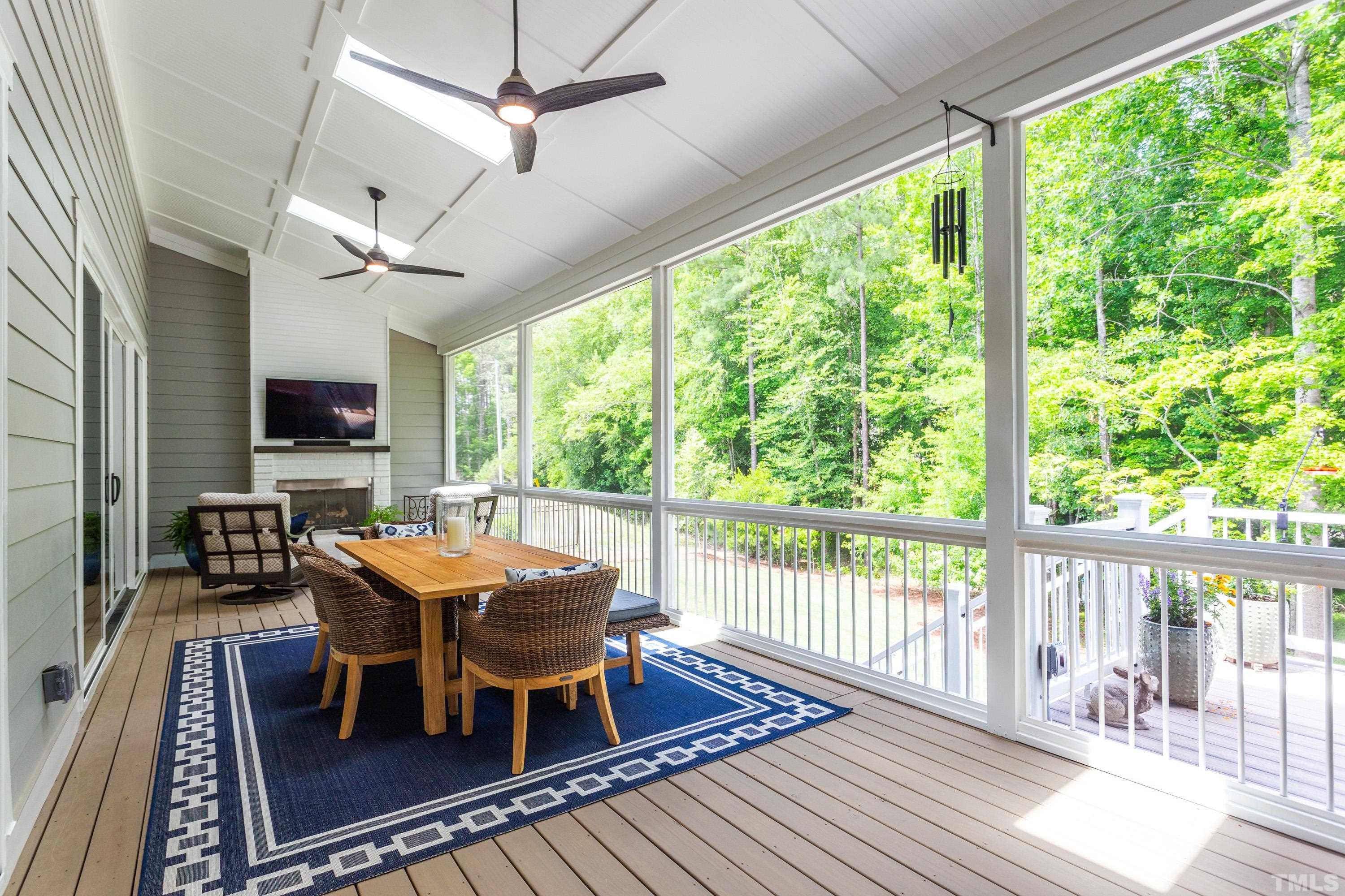 3013 Colmar Manor Drive Cary, NC 27519 - Photo 13 of 53 a view of a dining room with furniture window and wooden floor