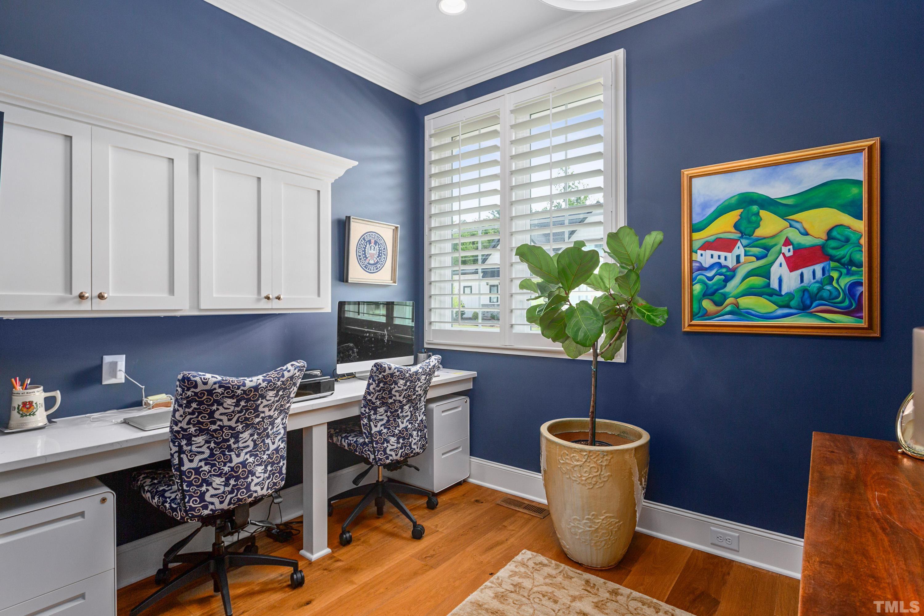 3013 Colmar Manor Drive Cary, NC 27519 - Photo 14 of 53 a work room with furniture and a potted plant
