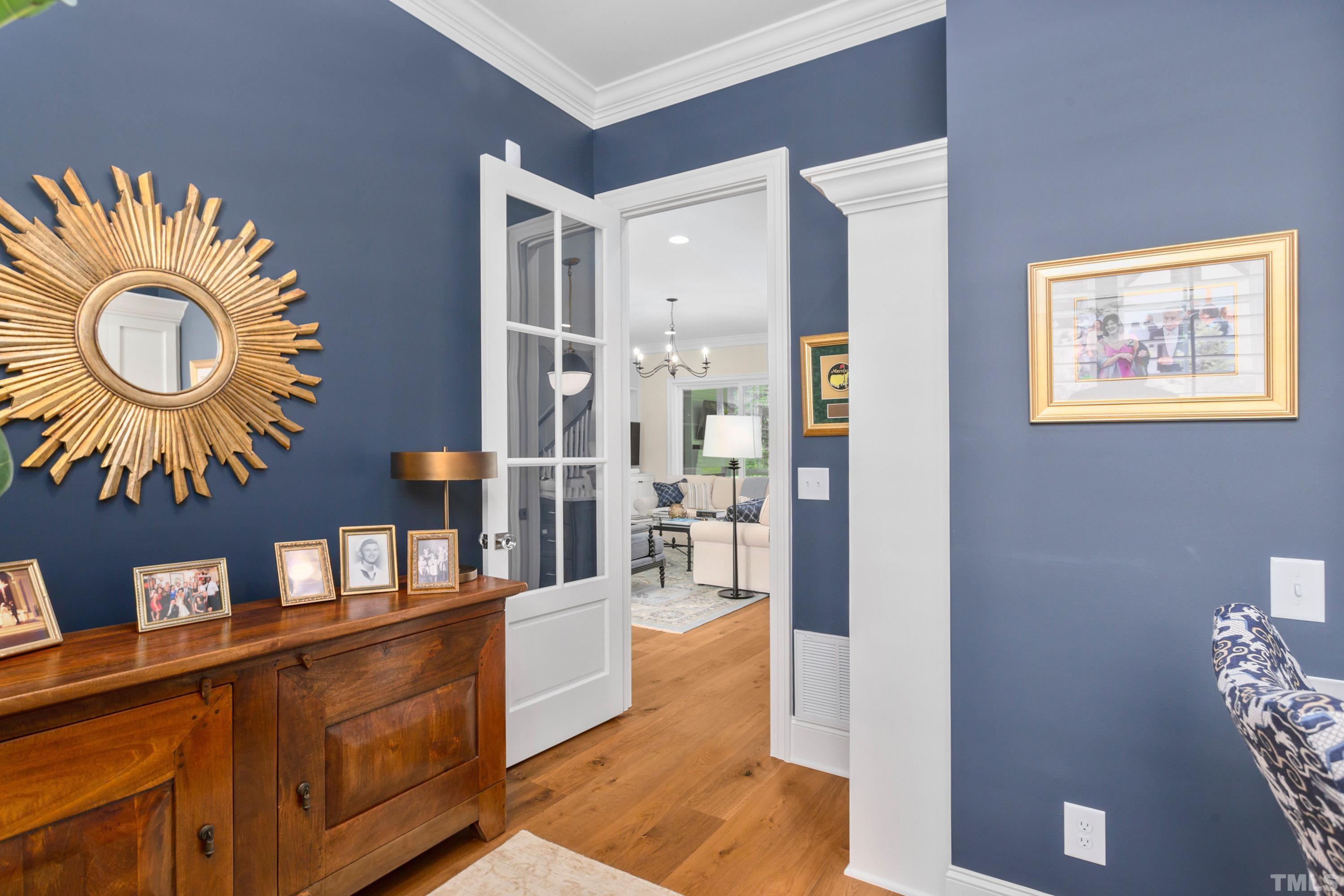 3013 Colmar Manor Drive Cary, NC 27519 - Photo 15 of 53 a living room with furniture and a wooden floor