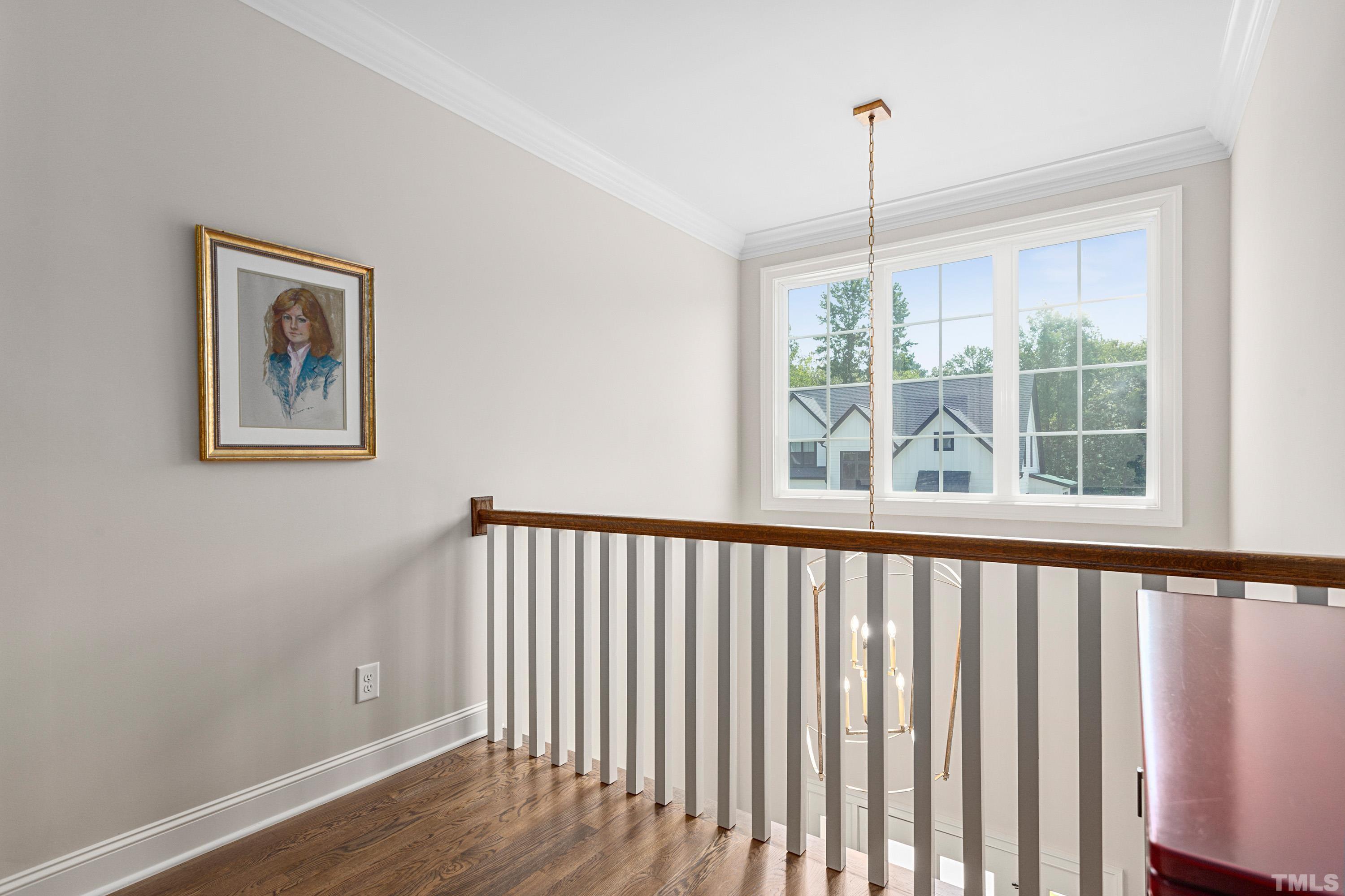 3013 Colmar Manor Drive Cary, NC 27519 - Photo 38 of 53 a view of a hallway with windows