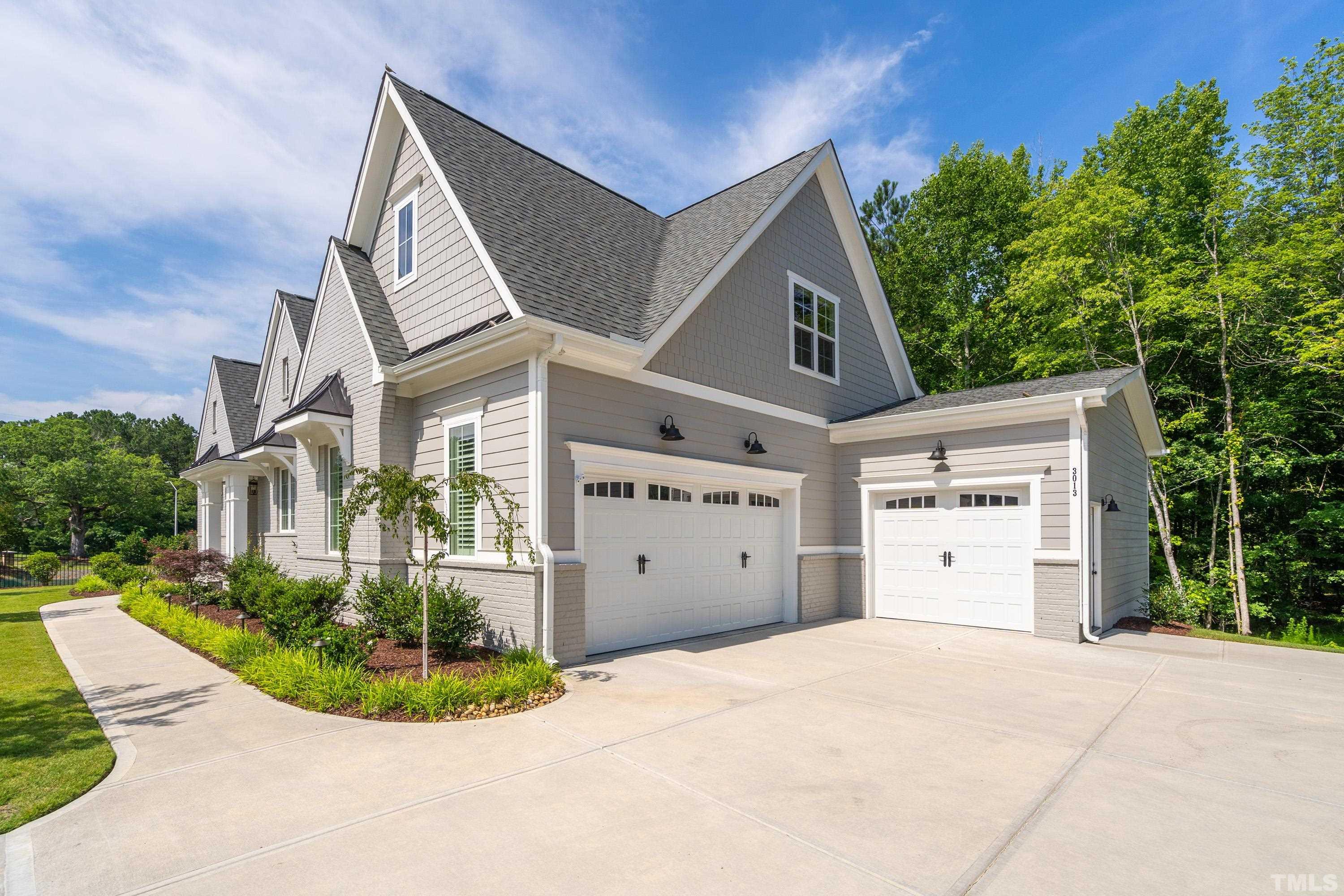 3013 Colmar Manor Drive Cary, NC 27519 - Photo 47 of 53 a view of a house with a yard