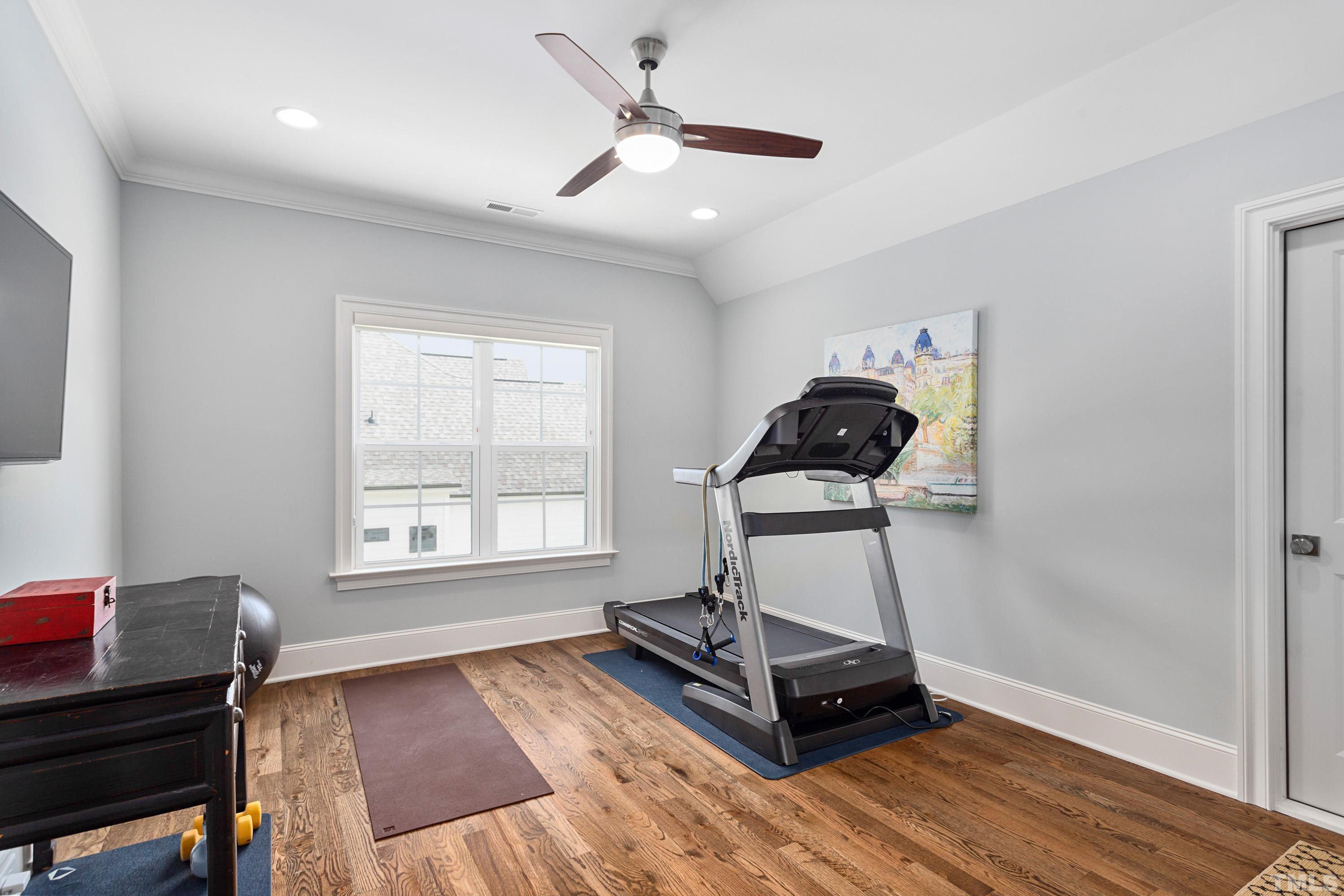 3013 Colmar Manor Drive Cary, NC 27519 - Photo 49 of 53 a living room with wooden floor furniture and a window