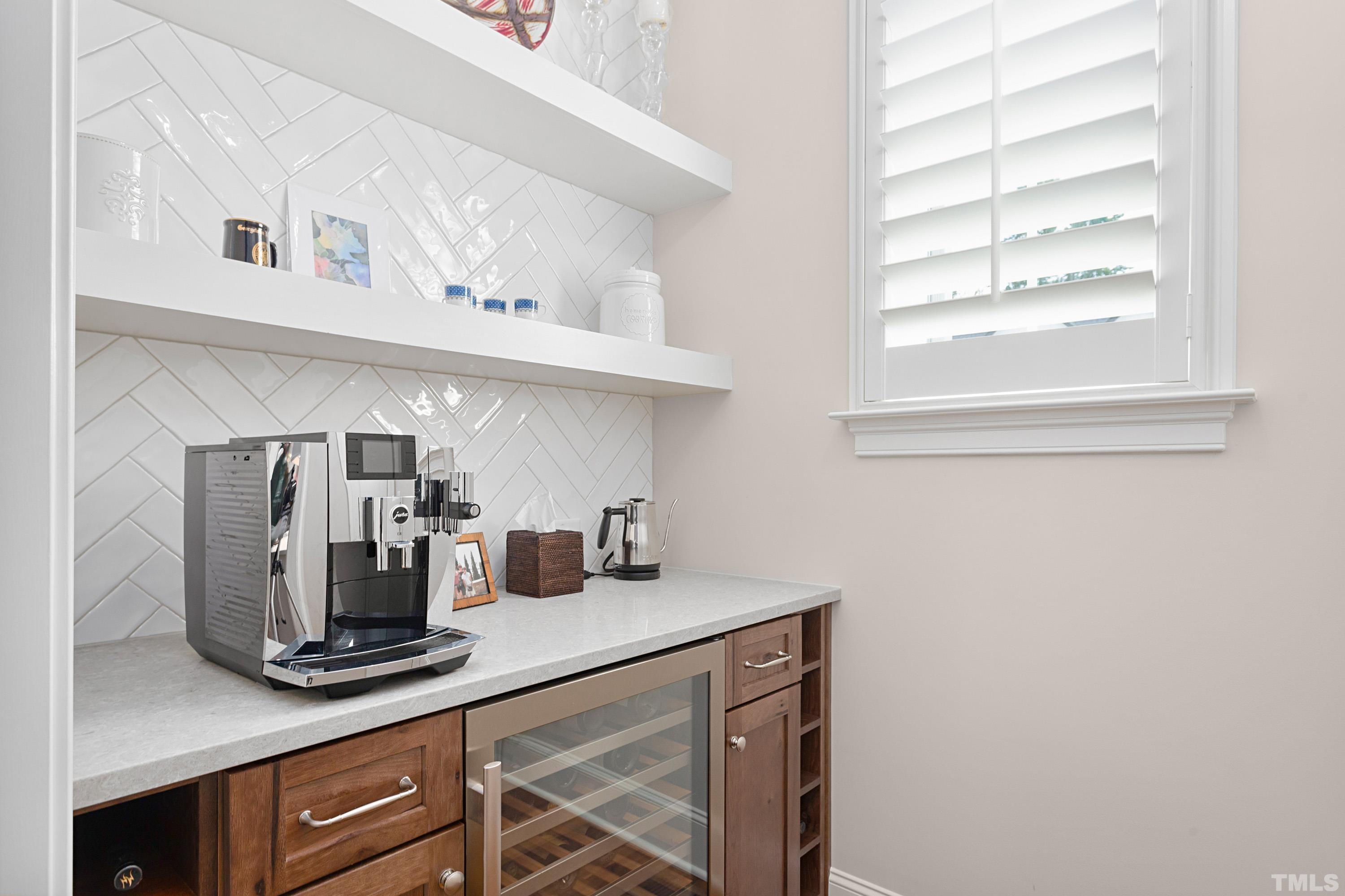 3013 Colmar Manor Drive Cary, NC 27519 - Photo 10 of 53 a kitchen with a sink cabinets and window