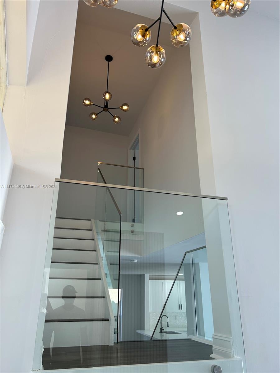 Three Lakes Miami, FL 33186 - Photo 2 of 32 a view of entryway and hall with wooden floor