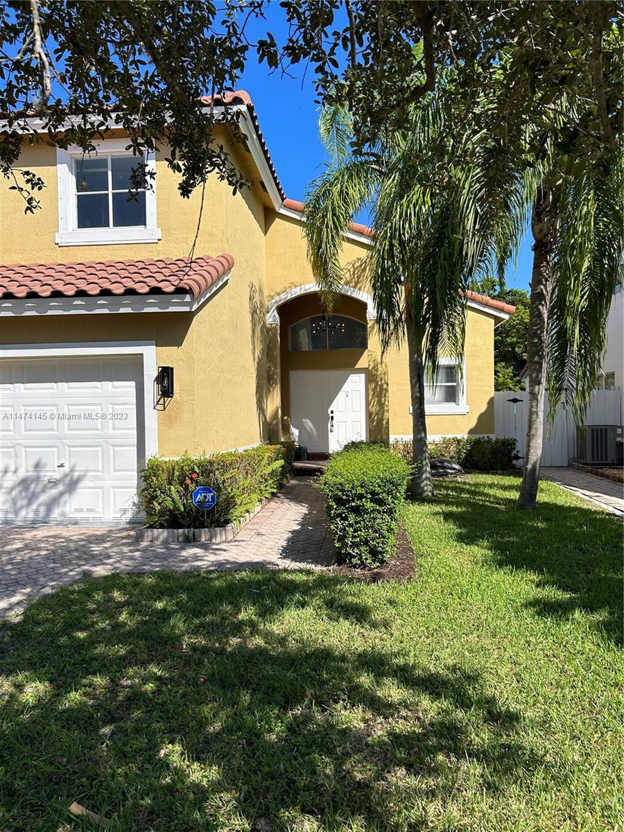 Three Lakes Miami, FL 33186 - Photo 23 of 32 a view of a house with a yard