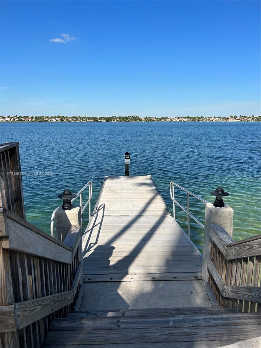 Three Lakes Miami, FL 33186 - Photo 30 of 32 a terrace of a house with outdoor seating