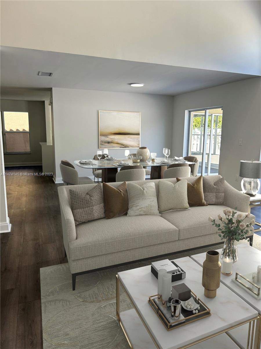Three Lakes Miami, FL 33186 - Photo 6 of 32 a living room with furniture and a wooden floor